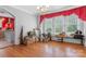 Sunlit living room featuring hardwood floors and a large window at 4335 E Nc 10 Hwy, Claremont, NC 28610