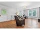 A view of the living room boasting hardwood floors, white walls, and natural light at 4335 E Nc 10 Hwy, Claremont, NC 28610