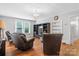 A living room with wood floors, furniture, and natural light at 4335 E Nc 10 Hwy, Claremont, NC 28610