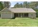 Expansive backyard view with a screened porch, ideal for enjoying the outdoors at 4660 Gold Finch Dr, Denver, NC 28037