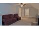 Bonus room with carpeted floors and comfortable seating at 4660 Gold Finch Dr, Denver, NC 28037