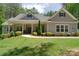 Charming single-story home with a welcoming front porch and manicured lawn at 4660 Gold Finch Dr, Denver, NC 28037