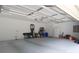 Well-organized two car garage with lots of storage and overhead door at 4660 Gold Finch Dr, Denver, NC 28037