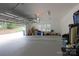 Spacious garage with ample room for parking and storage, well-lit with natural light at 4660 Gold Finch Dr, Denver, NC 28037