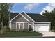 Charming single-story home with gray siding, stone accents, and a well-manicured lawn and attached two car garage at 5111 Raging Creek Dr, Indian Trail, NC 28079