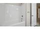 Bright white bathtub and shower combo in a clean, modern bathroom at 528 S Caldwell St, Salisbury, NC 28144