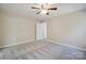 Bedroom showcasing a neutral color palette and soft carpet at 528 S Caldwell St, Salisbury, NC 28144