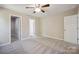 Bedroom with a walk-in closet and multiple entry doors at 528 S Caldwell St, Salisbury, NC 28144