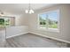 Inviting dining area featuring grey flooring and natural light at 528 S Caldwell St, Salisbury, NC 28144