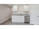 Kitchen area showcasing white cabinets, granite counters, and stainless steel appliances at 528 S Caldwell St, Salisbury, NC 28144
