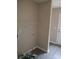 Laundry room with vinyl floors, shelf, and washer and dryer hook ups at 528 S Caldwell St, Salisbury, NC 28144
