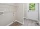 Laundry area with washer and dryer hookups and vinyl floors at 528 S Caldwell St, Salisbury, NC 28144