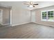 Bright living room showcasing modern light-colored walls and wood-look flooring at 528 S Caldwell St, Salisbury, NC 28144