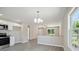 Open living space featuring grey floors, neutral walls and natural light at 528 S Caldwell St, Salisbury, NC 28144