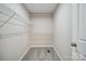 Empty walk-in closet with carpet and wire shelving racks at 528 S Caldwell St, Salisbury, NC 28144
