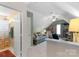 An additional view of the bonus room leading to a bathroom and showing its spacious layout at 6104 Follow The Trl, Indian Trail, NC 28079