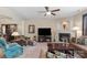 Spacious living room featuring comfortable seating, a fireplace, and stylish decor at 6104 Follow The Trl, Indian Trail, NC 28079