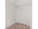 Empty walk-in closet with carpeted floors and wire shelving at 616 Station St # 45, Clover, SC 29710