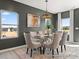 Dining room with modern chandelier and lots of natural light at 616 Station St # 45, Clover, SC 29710