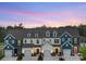 Charming townhomes feature craftsman-style architecture and inviting front entrances at 616 Station St # 45, Clover, SC 29710