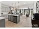 Open-concept kitchen featuring an island, stainless steel appliances and barstool seating at 616 Station St # 45, Clover, SC 29710