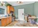 Features a stainless steel oven, wooden cabinets, and tiled floors at 634 E Center Ave, Mooresville, NC 28115