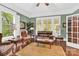 A cozy living room with hardwood floors, neutral walls, and classic furniture at 634 E Center Ave, Mooresville, NC 28115