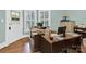 Home office featuring hardwood floors and natural light at 634 E Center Ave, Mooresville, NC 28115