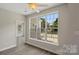 Inviting living room with lots of natural light, backyard views, and open space at 6614 Truman St, Indian Trail, NC 28079