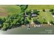 Stunning aerial view of a lake house with a private dock and lush green surroundings at 6822 Zelda Dr, Catawba, NC 28609