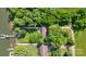 Aerial view of property featuring the home, long driveway, water access, and a pier at 6822 Zelda Dr, Catawba, NC 28609