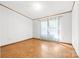 An empty room, featuring wood flooring and neutral wall color at 6822 Zelda Dr, Catawba, NC 28609