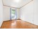 Sunlit bedroom with light-colored walls and wood-look floors at 6822 Zelda Dr, Catawba, NC 28609