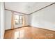 Sunny bedroom featuring wood-look flooring and natural lighting at 6822 Zelda Dr, Catawba, NC 28609
