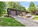 Exterior view of home and garage, surrounded by lush green landscaping at 6822 Zelda Dr, Catawba, NC 28609