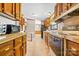 Traditional kitchen featuring wood cabinets and functional layout at 6822 Zelda Dr, Catawba, NC 28609