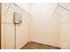 An empty walk-in closet features white wire shelving and wood-look flooring at 6822 Zelda Dr, Catawba, NC 28609