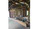 Interior view of a house being renovated, with exposed framing, new building materials, and open spaces at 720 Mutual Rd, Gastonia, NC 28052