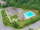 Aerial view of the community pool and meticulously landscaped walking paths at 7325 Overmountain Dr, Rock Hill, SC 29732