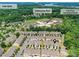 Aerial view showcasing the community pool, nearby Lake Wylie, and India Hook Elementary School at 7325 Overmountain Dr, Rock Hill, SC 29732