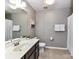 Bathroom featuring a vanity, mirror, and shower/tub combination at 7325 Overmountain Dr, Rock Hill, SC 29732