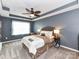 Cozy bedroom featuring a ceiling fan, soft carpet, and natural light from the window at 7325 Overmountain Dr, Rock Hill, SC 29732