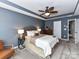 Bedroom with gray walls, ceiling fan, and neutral carpet at 7325 Overmountain Dr, Rock Hill, SC 29732