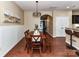 Charming dining room with modern lighting and stylish wainscoting at 7325 Overmountain Dr, Rock Hill, SC 29732