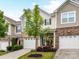 Attractive exterior showcasing a one-car garage, tidy landscaping, and classic architectural details at 7325 Overmountain Dr, Rock Hill, SC 29732