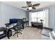 Office features two monitors, a desk and ceiling fan at 7325 Overmountain Dr, Rock Hill, SC 29732