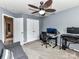 Office with desk setup, ceiling fan and natural light at 7325 Overmountain Dr, Rock Hill, SC 29732