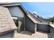 A modern balcony features gray siding, a composite deck, and a view of the neighborhood rooftops at 743 Anderson St, Charlotte, NC 28205