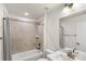 Bathroom featuring a tub with neutral tile and chrome shower fixtures at 743 Anderson St, Charlotte, NC 28205