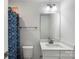 Bathroom features shower with vanity and bronze faucet at 743 Anderson St, Charlotte, NC 28205